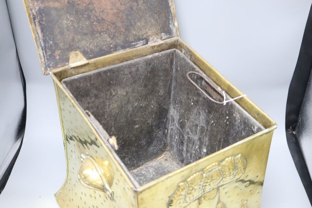 An Art Nouveau brass coal scuttle, height 33cm